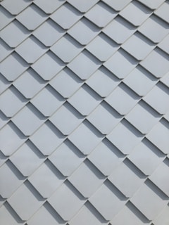 Close-up of ceramic tiles arranged in a modern pattern.