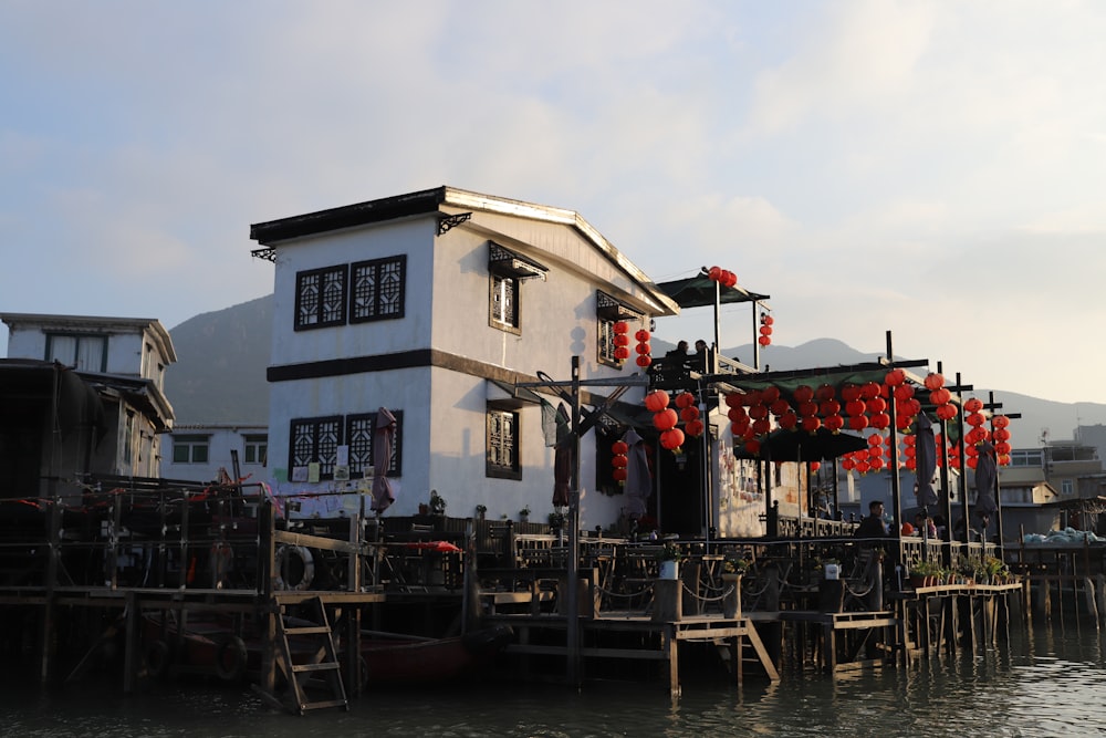 white 2-storey house beside sea