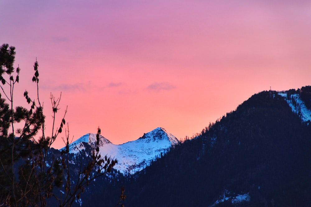 snow covered mountain during daytime