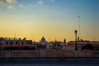 A warm, inviting view of the Basilica di Sant'Anastasia al Palatino entrance at sunset.