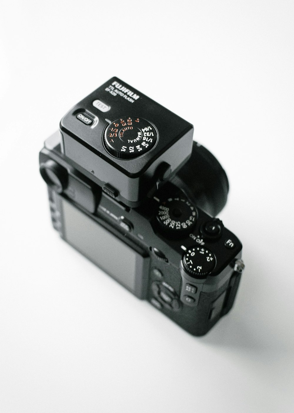 black Fujifilm DSLR camera