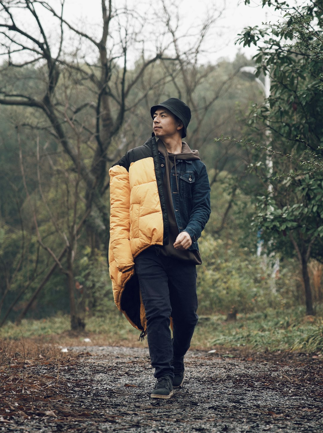 man wearing yellow and black bobble jacket