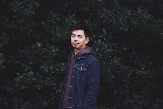 man wearing denim blue jacket