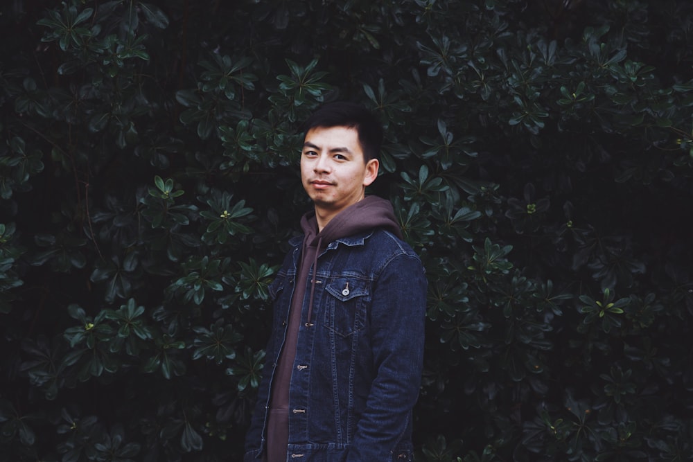 man wearing denim blue jacket