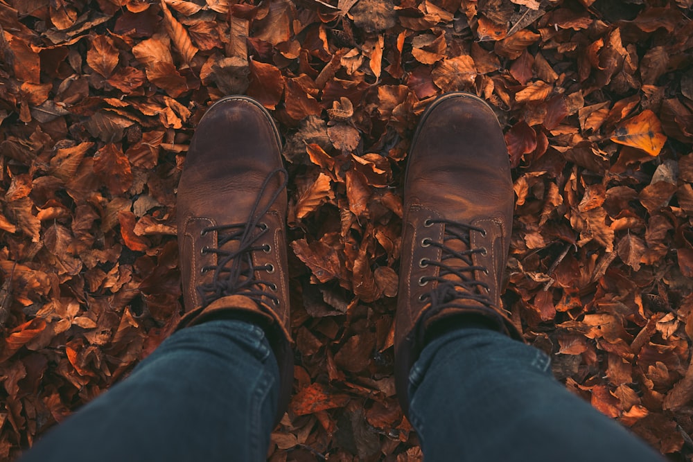 person wearing maroon boots