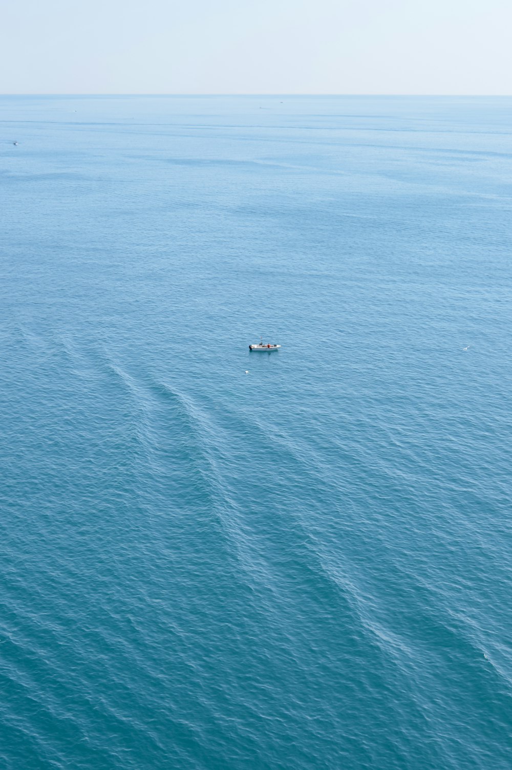 boat on calm body of water