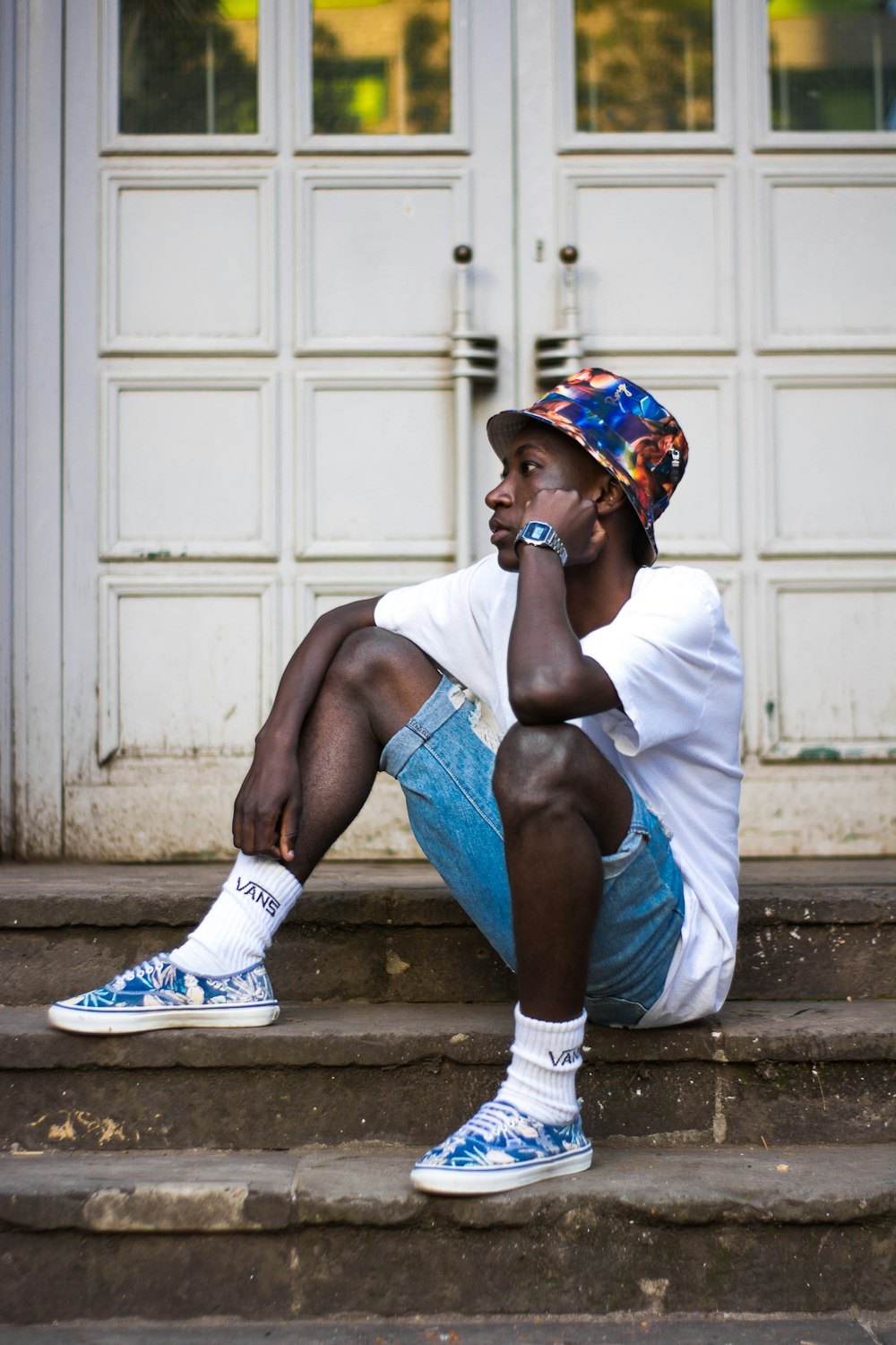 man sitting on stairs