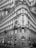 A tall, ornate European building with intricate architectural details and multiple windows. The lower portion features a CSOB bank entrance. The building exhibits classical styling with arched windows and decorative elements.