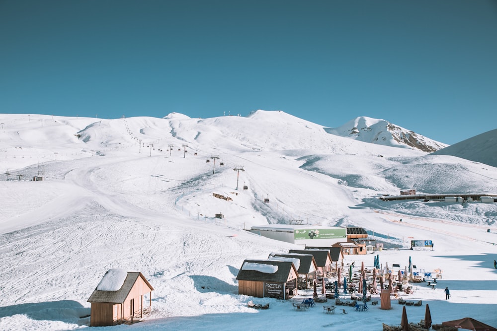 houses near snow mountain