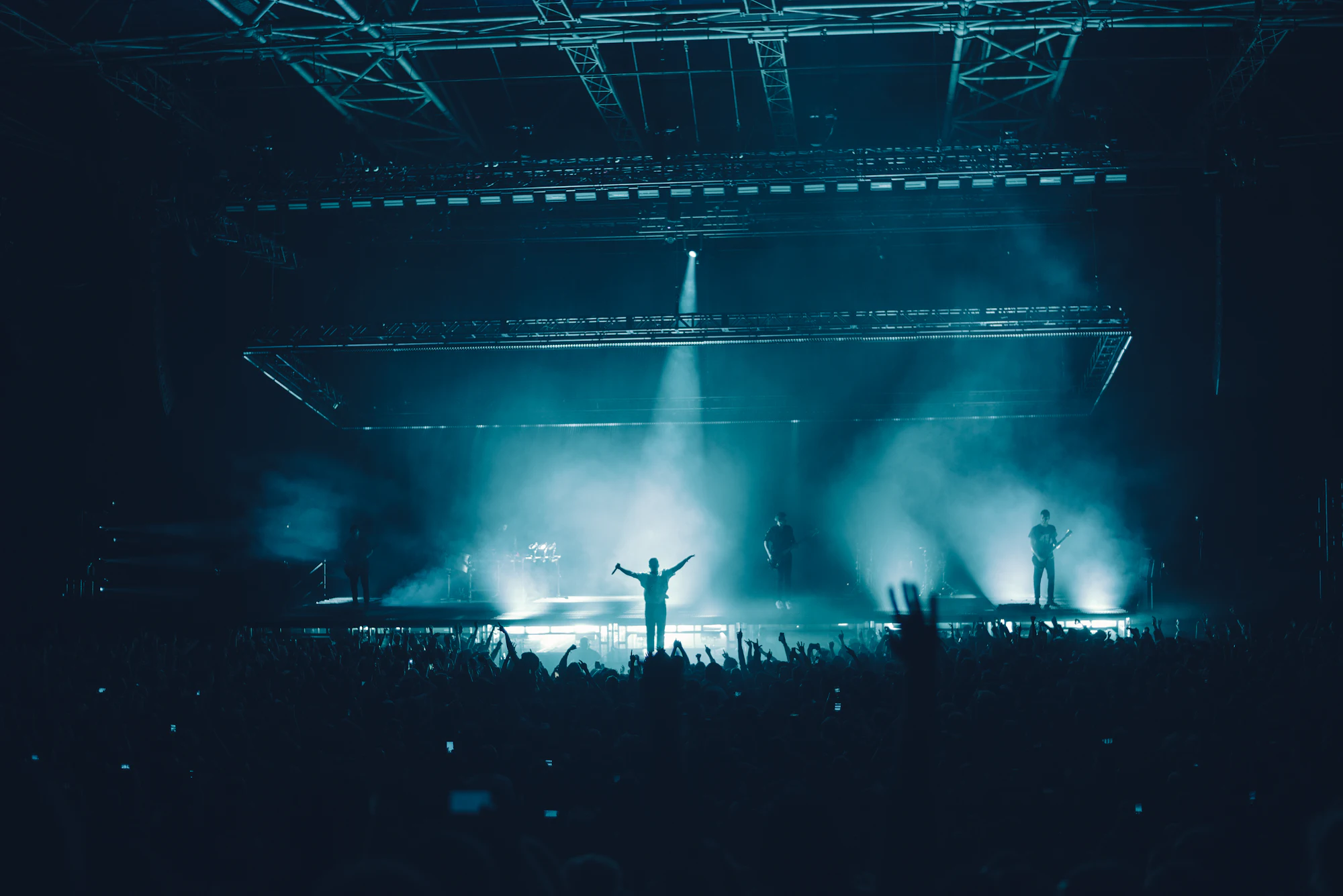 Audience in front of a lit stage