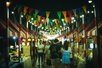 A vibrant street market in Chiang Mai bustling with colorful stalls and smiling locals.