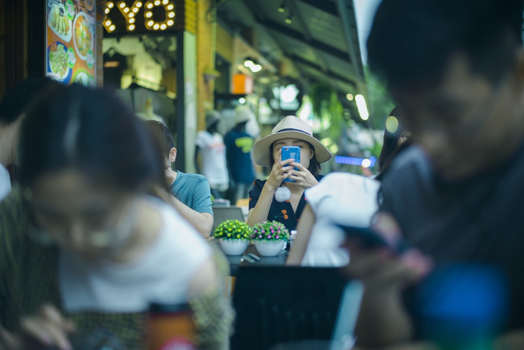 woman holding phone