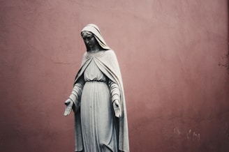 woman wearing dress statue