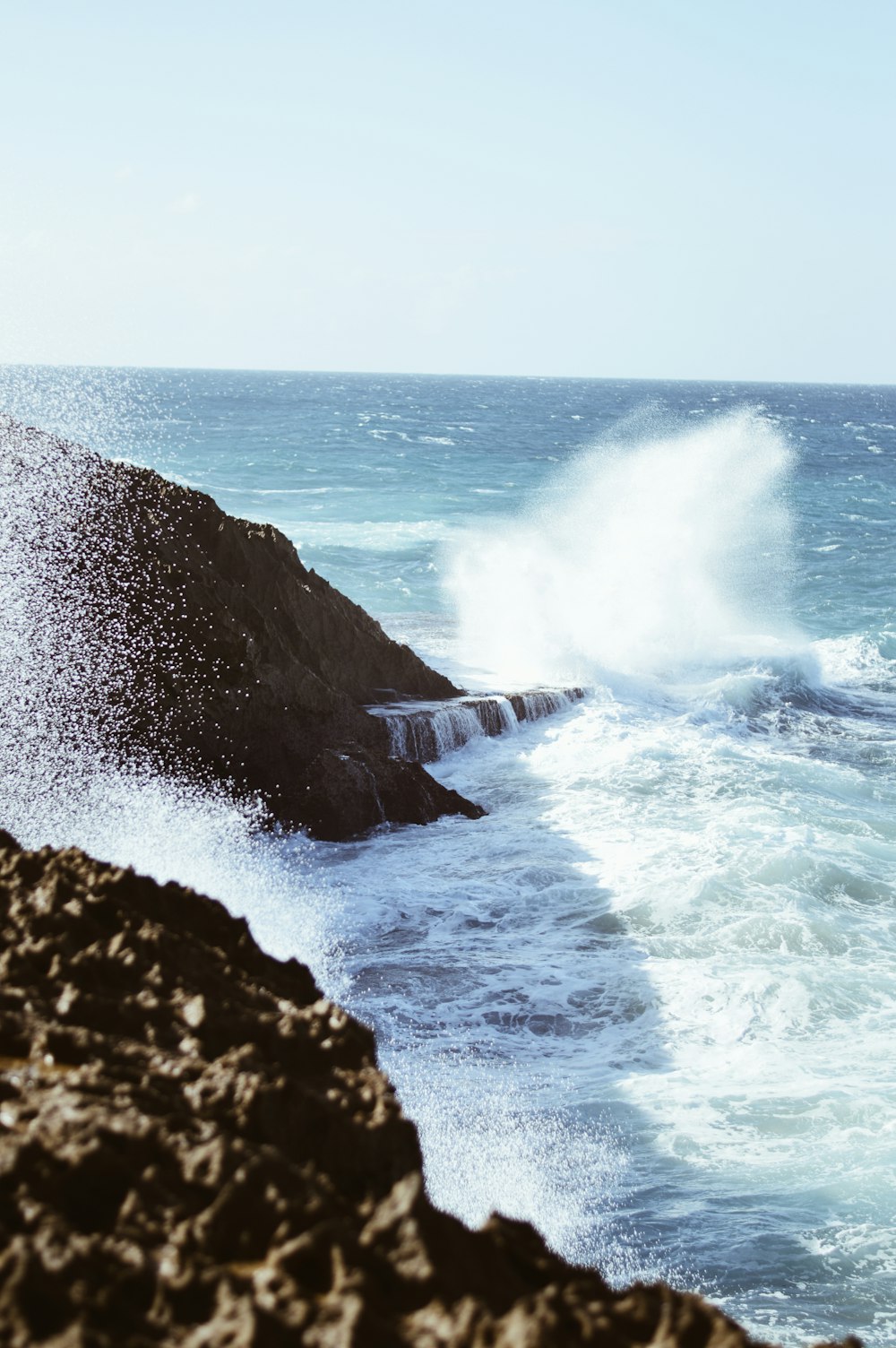 aerial view photography of rocky shore