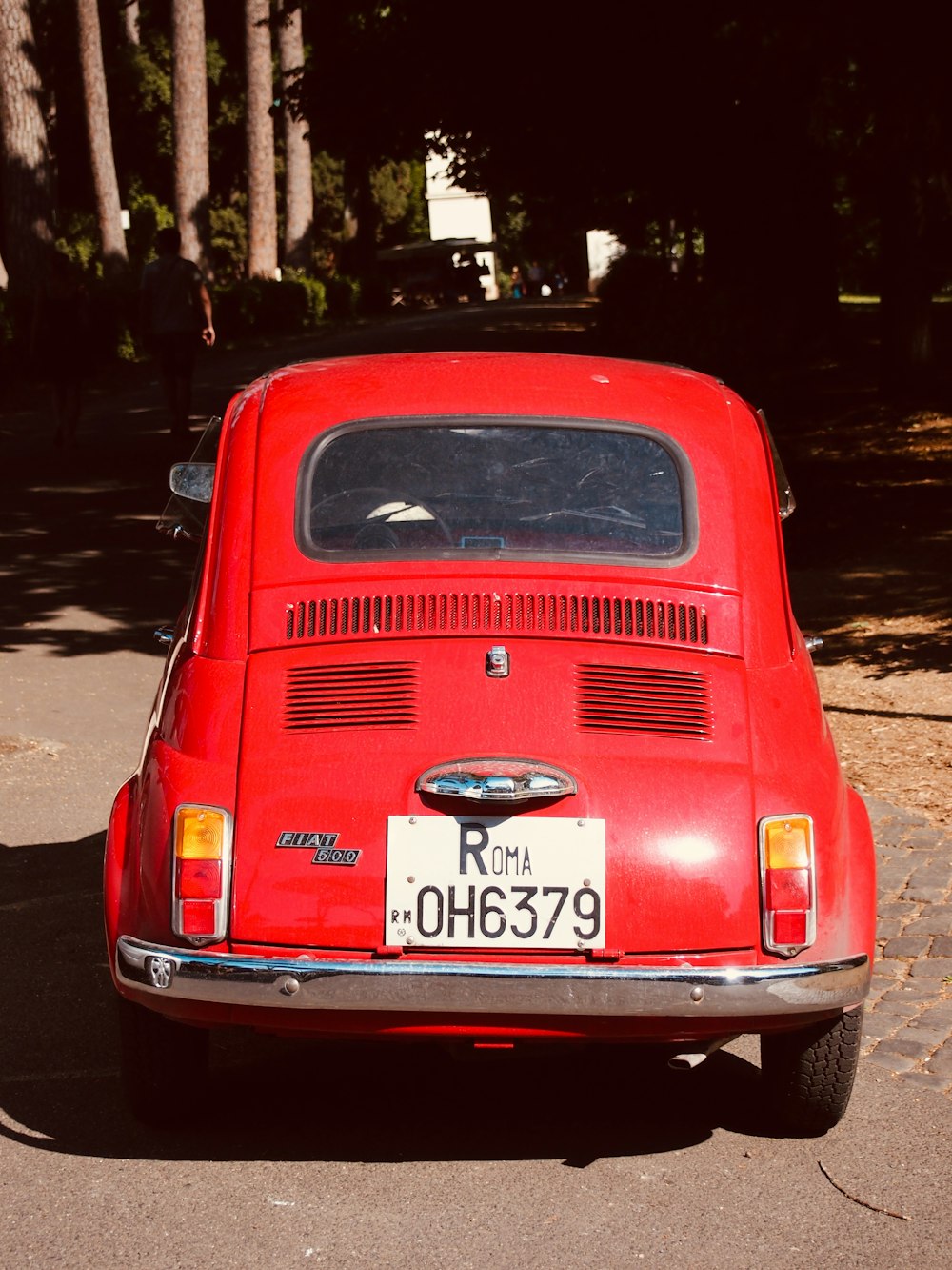 red Citroen 2CV on road