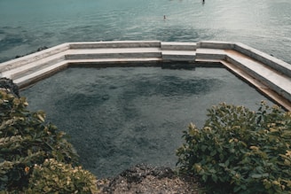 A natural swimming pool surrounded by nature.