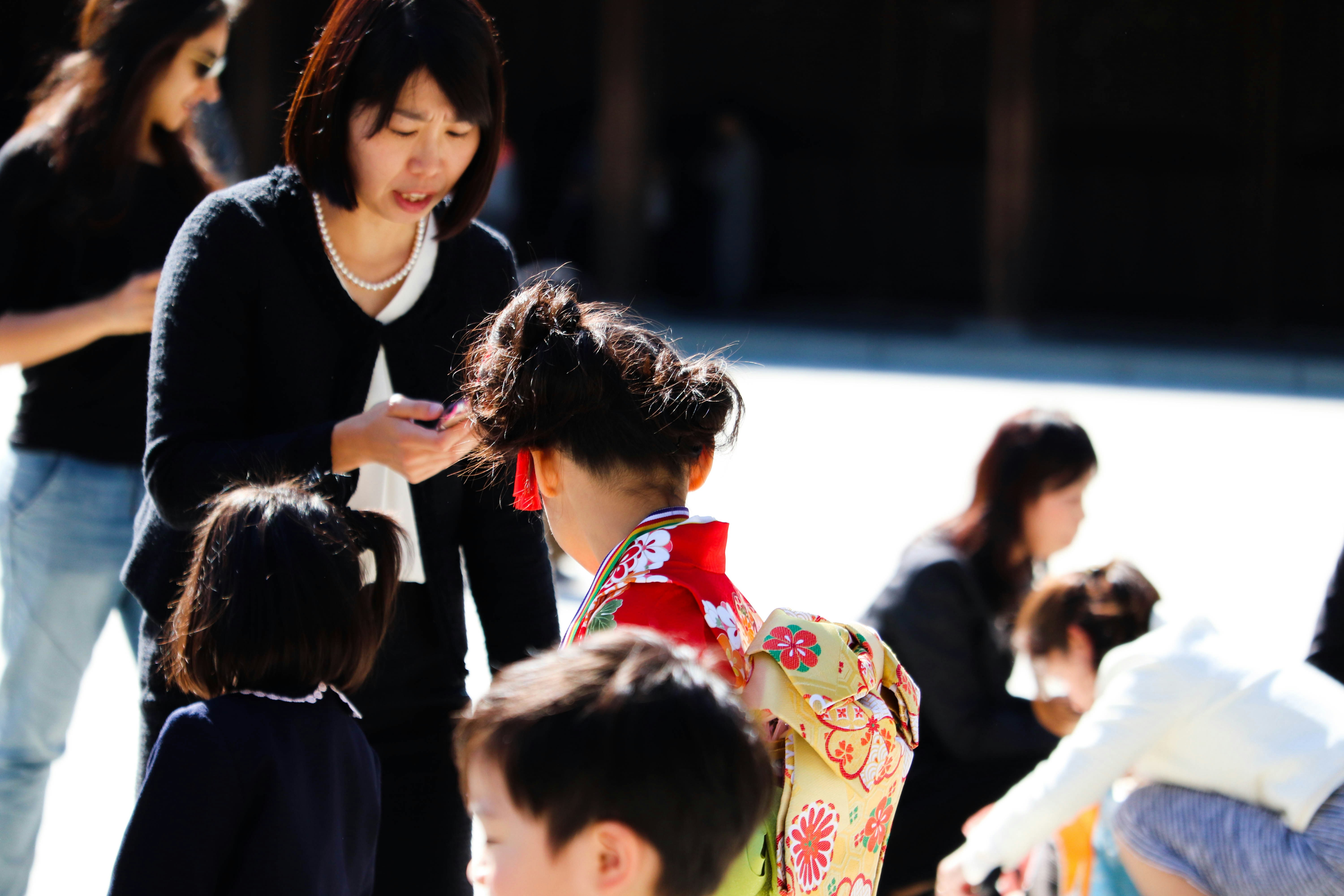 Person searching on smartphone for 'Holiday emergency clinic Japan'