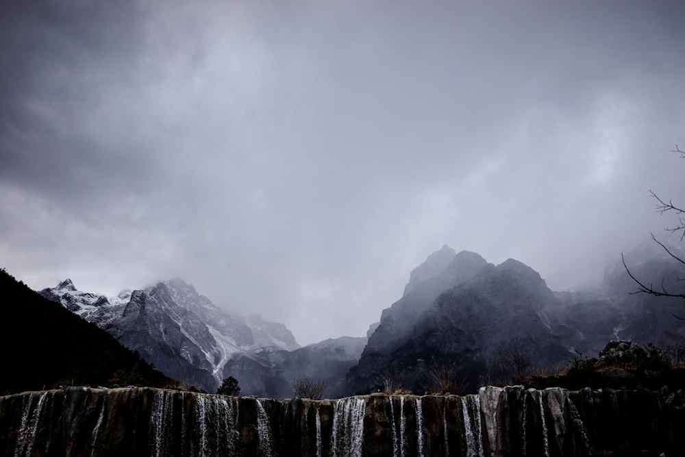 waterfalls in grayscale photography