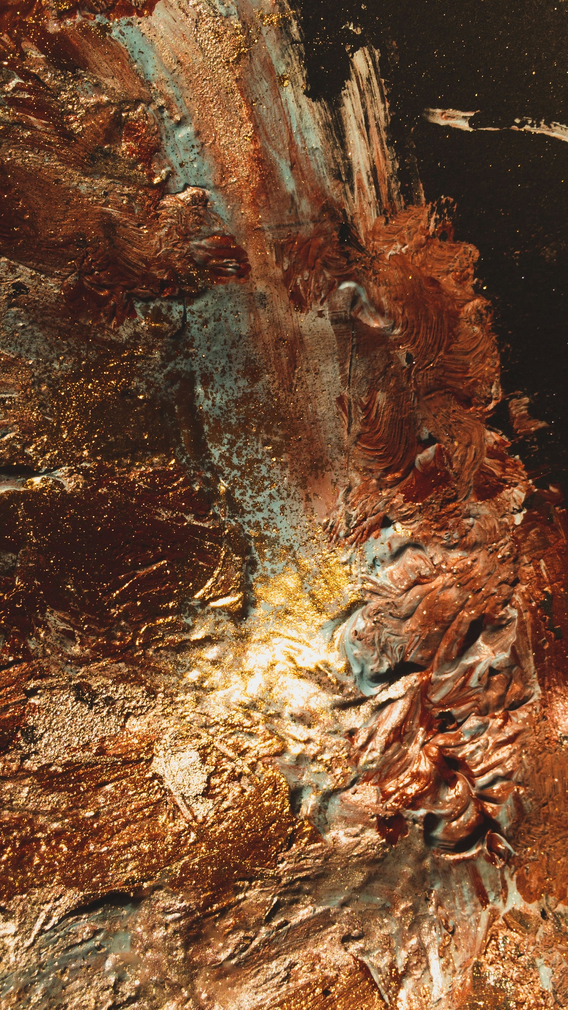 A hand-painted canvas with elegant brushstrokes in neutral tones, highlighted by shimmering gold details that catch the light.