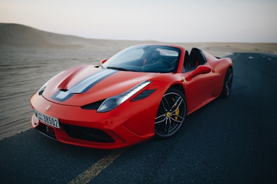 red ferrari f430 scuderia on road ferrari zoom background