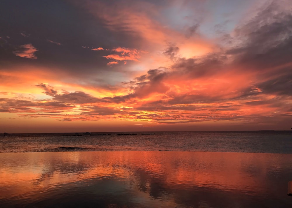 body of water during golden hour