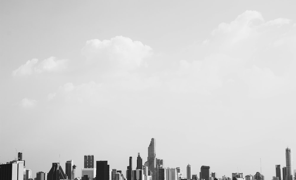 grayscale panoramic photo of buildings