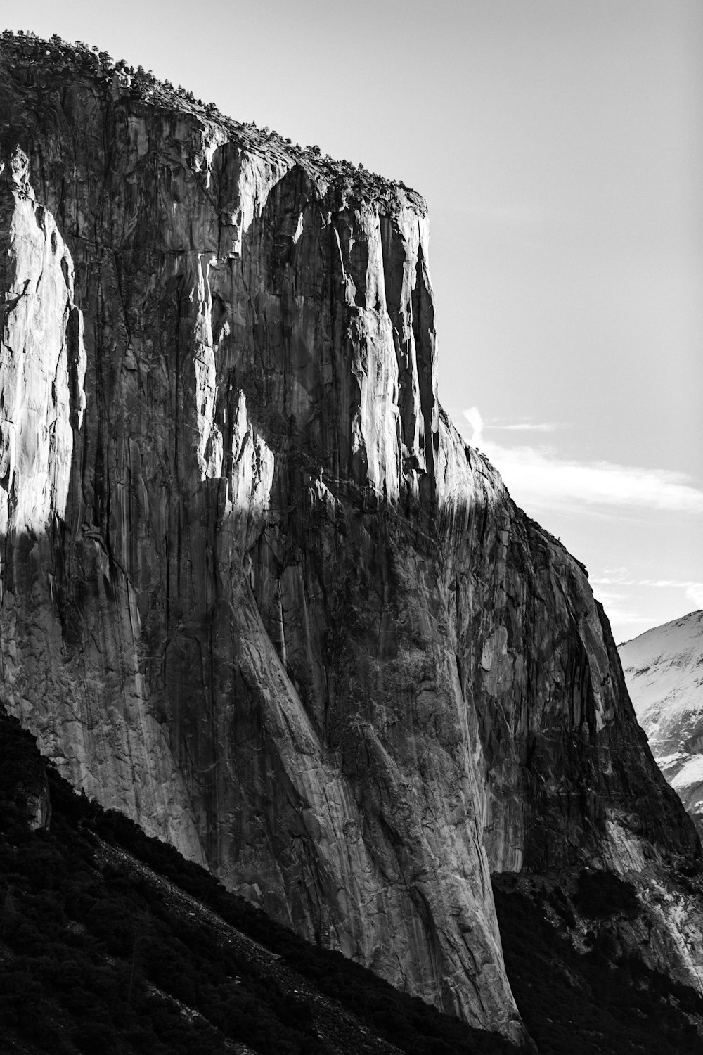 greyscale photography of rock formation
