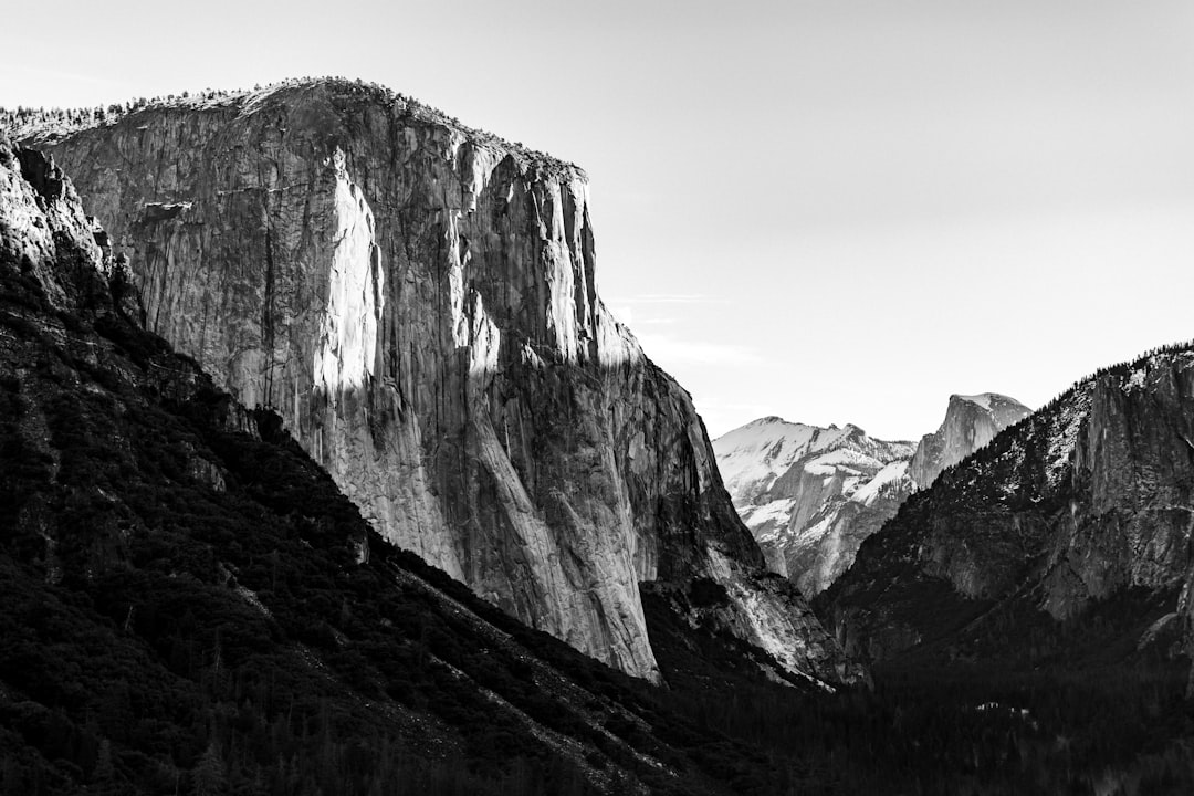 grayscale photography of mountain alps