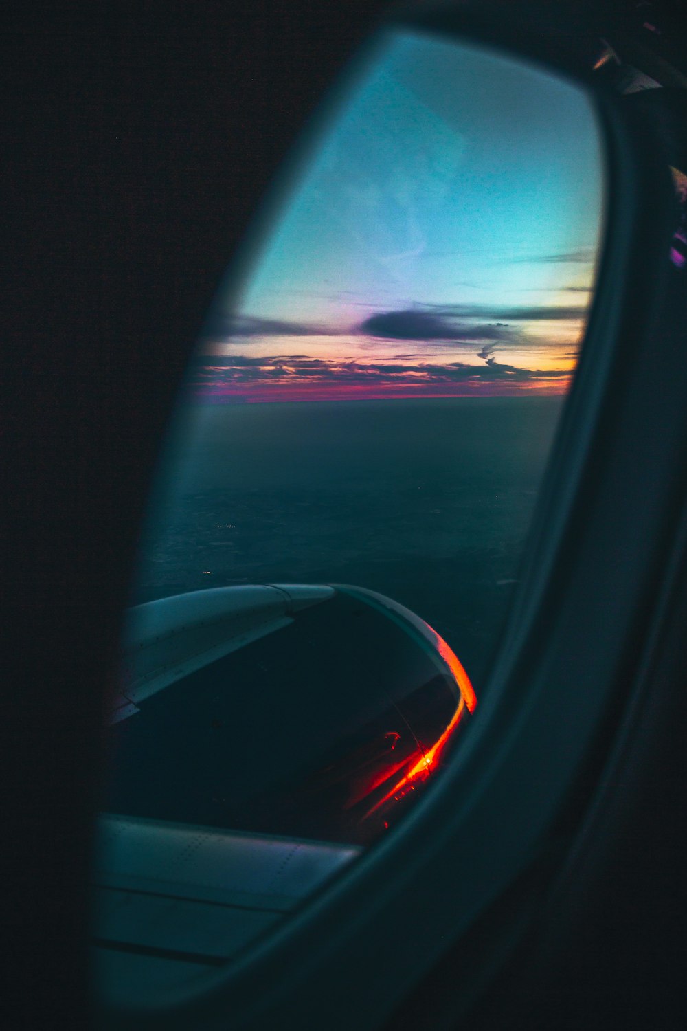 airplane window during golden hour