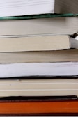 A close-up of a stack of newly published books.