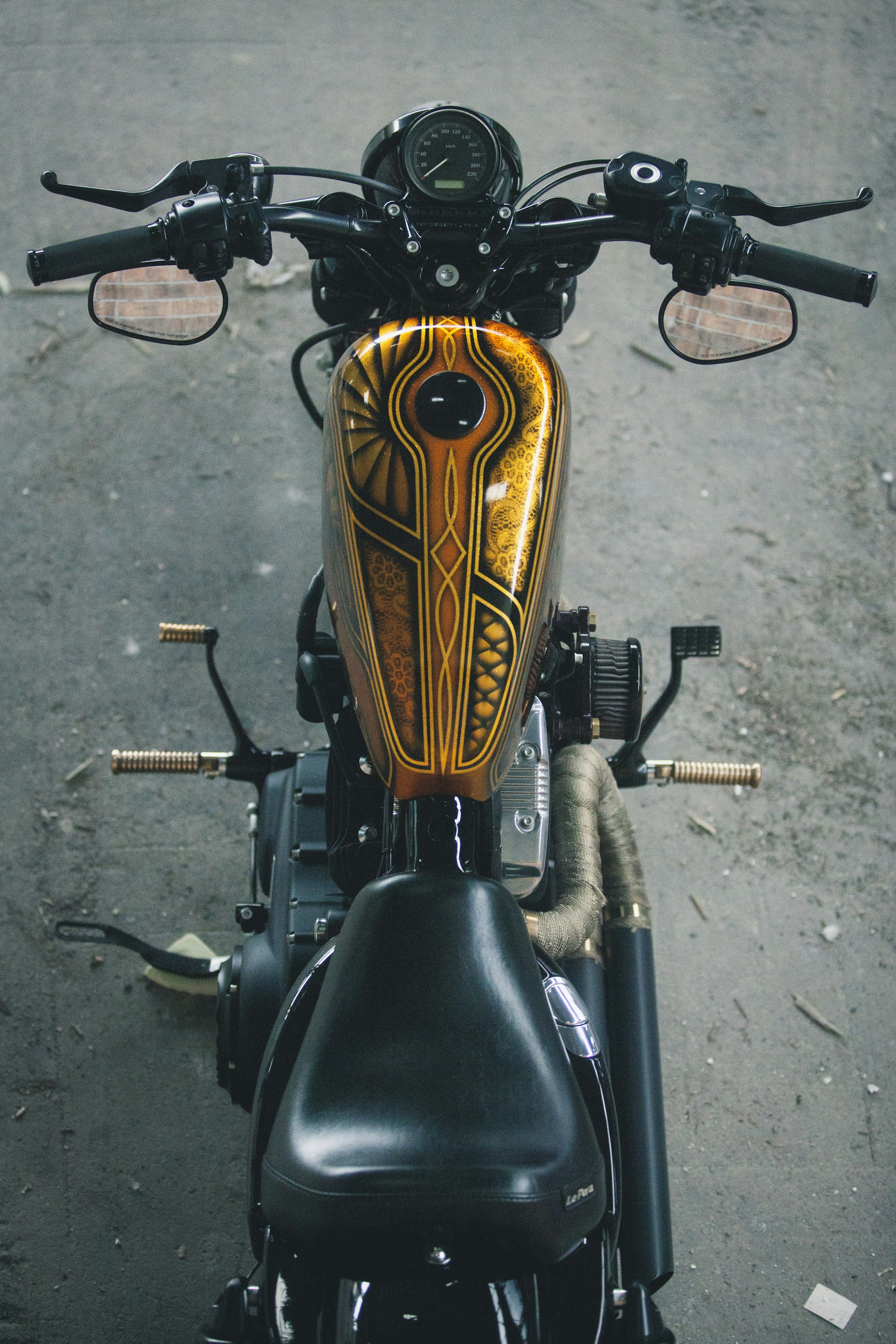 brown and black cruiser motorcycle