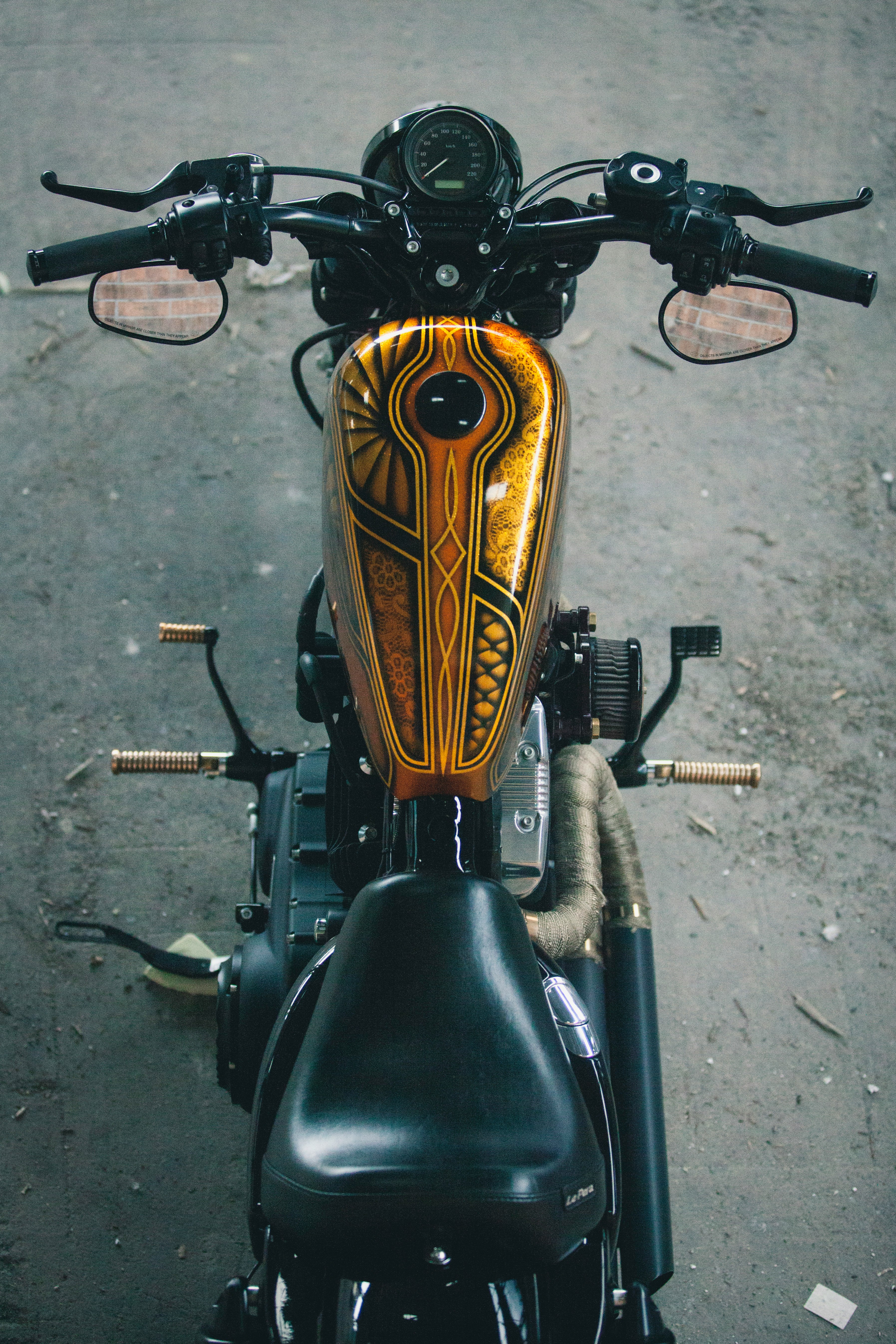 brown and black cruiser motorcycle