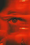 close-up of eye in red light