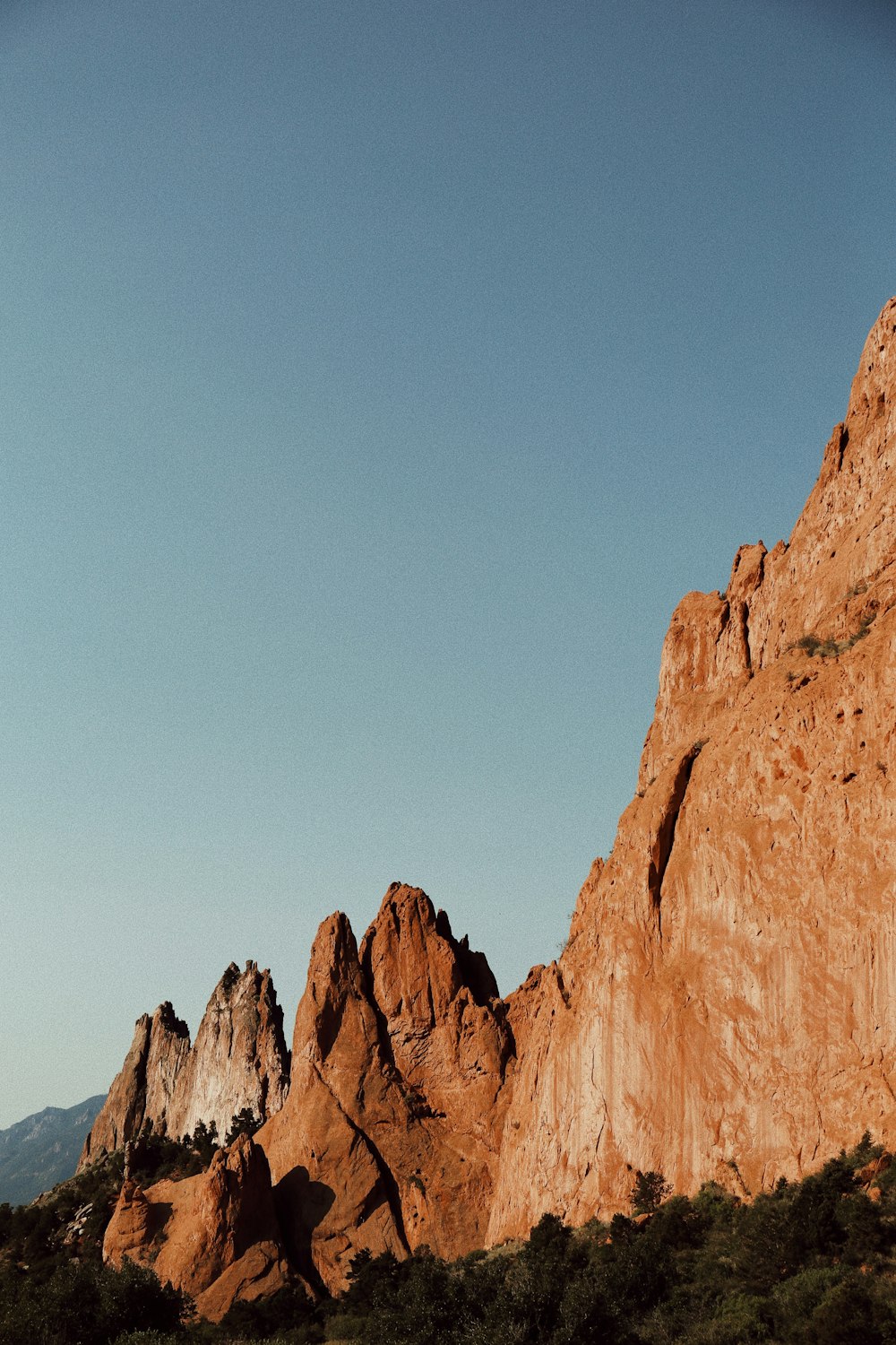 brown mountain under blue sky