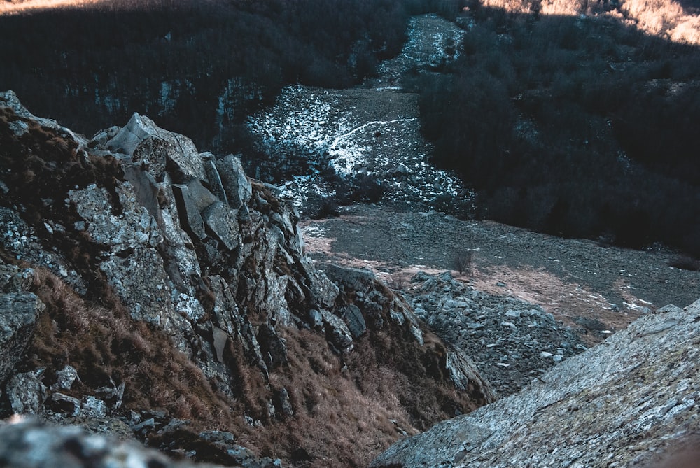 brown rock formation under sunny sky