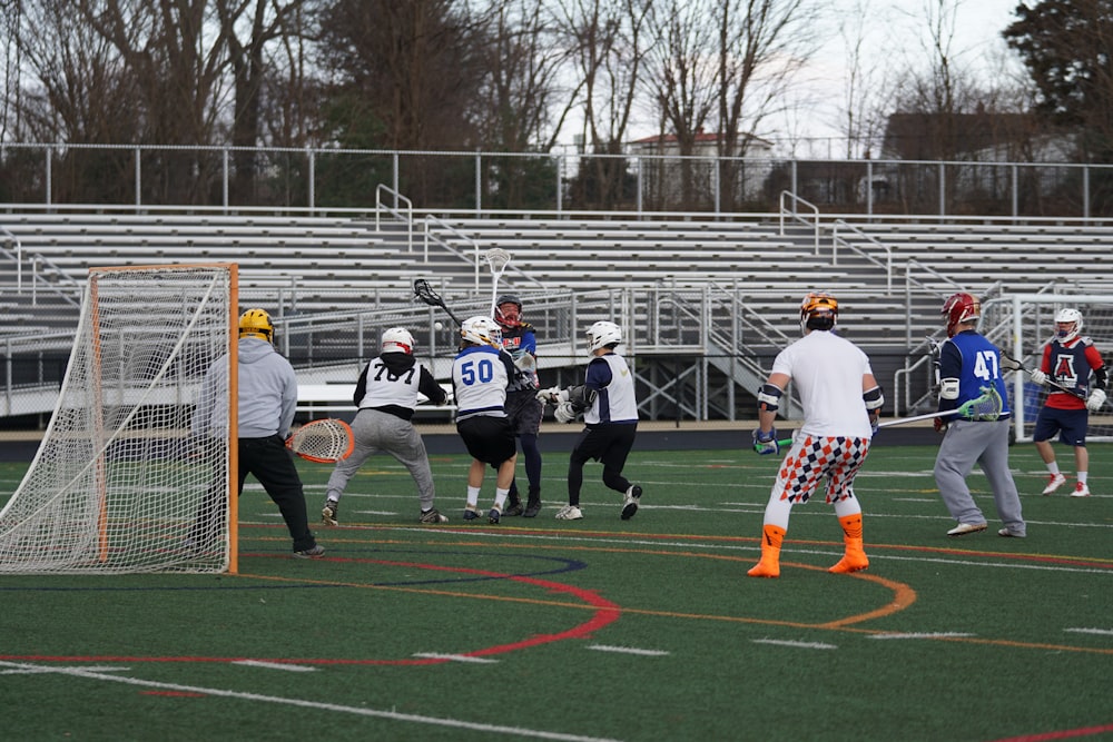 lacrosse players on field