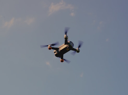 flying gray quadcopter