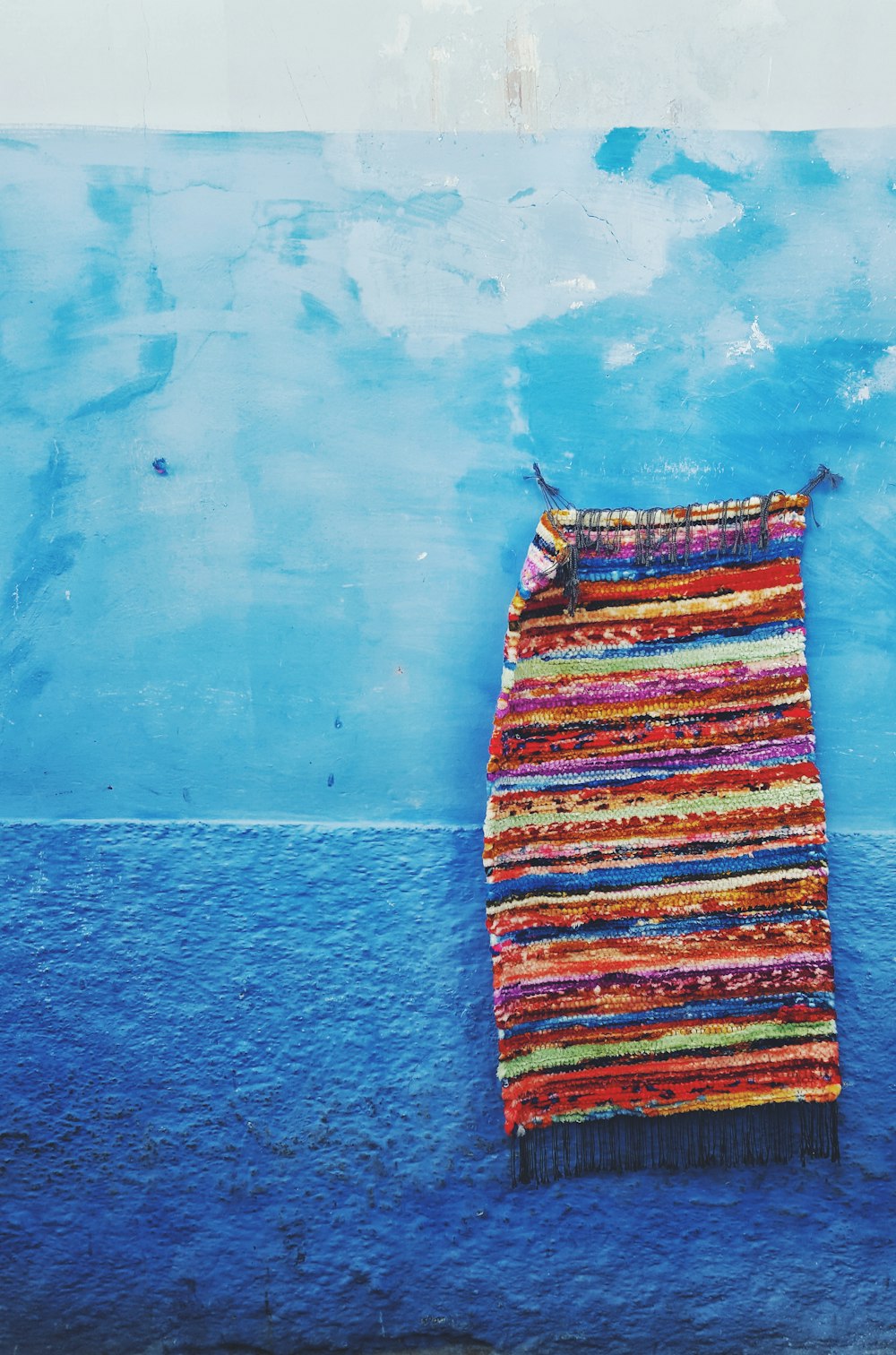 multi-colored fringed textile