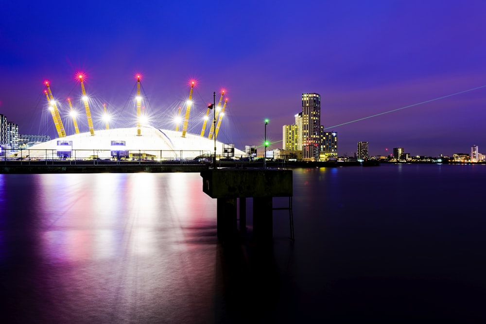 oil rig and high rise building digital wallpaper