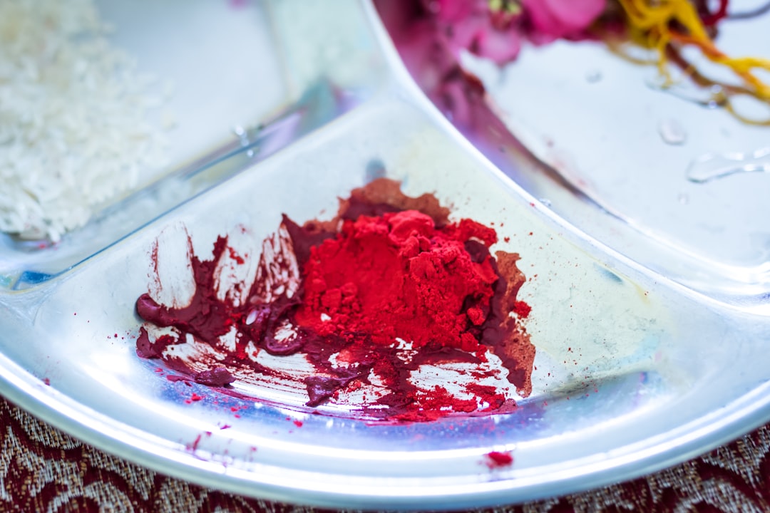 red powder on white ceramic plate