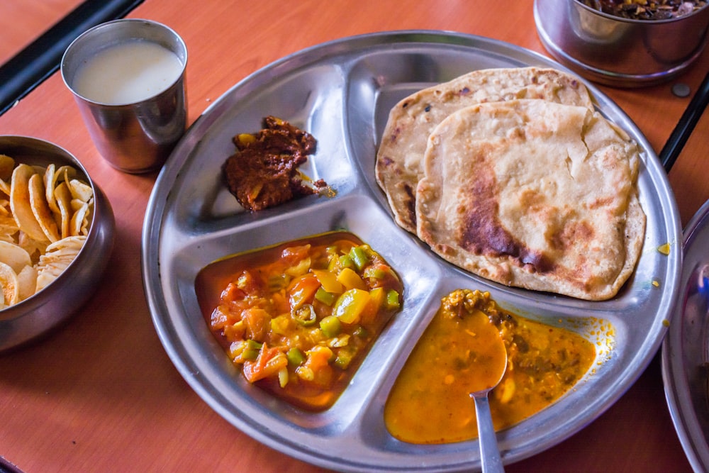 cooked food on round tray