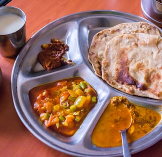 cooked food on round tray