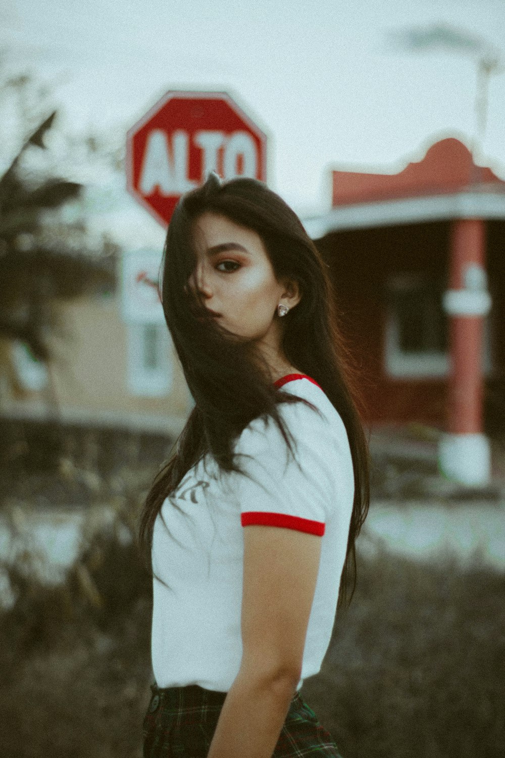 selective focus photography of woman wearing white shirt