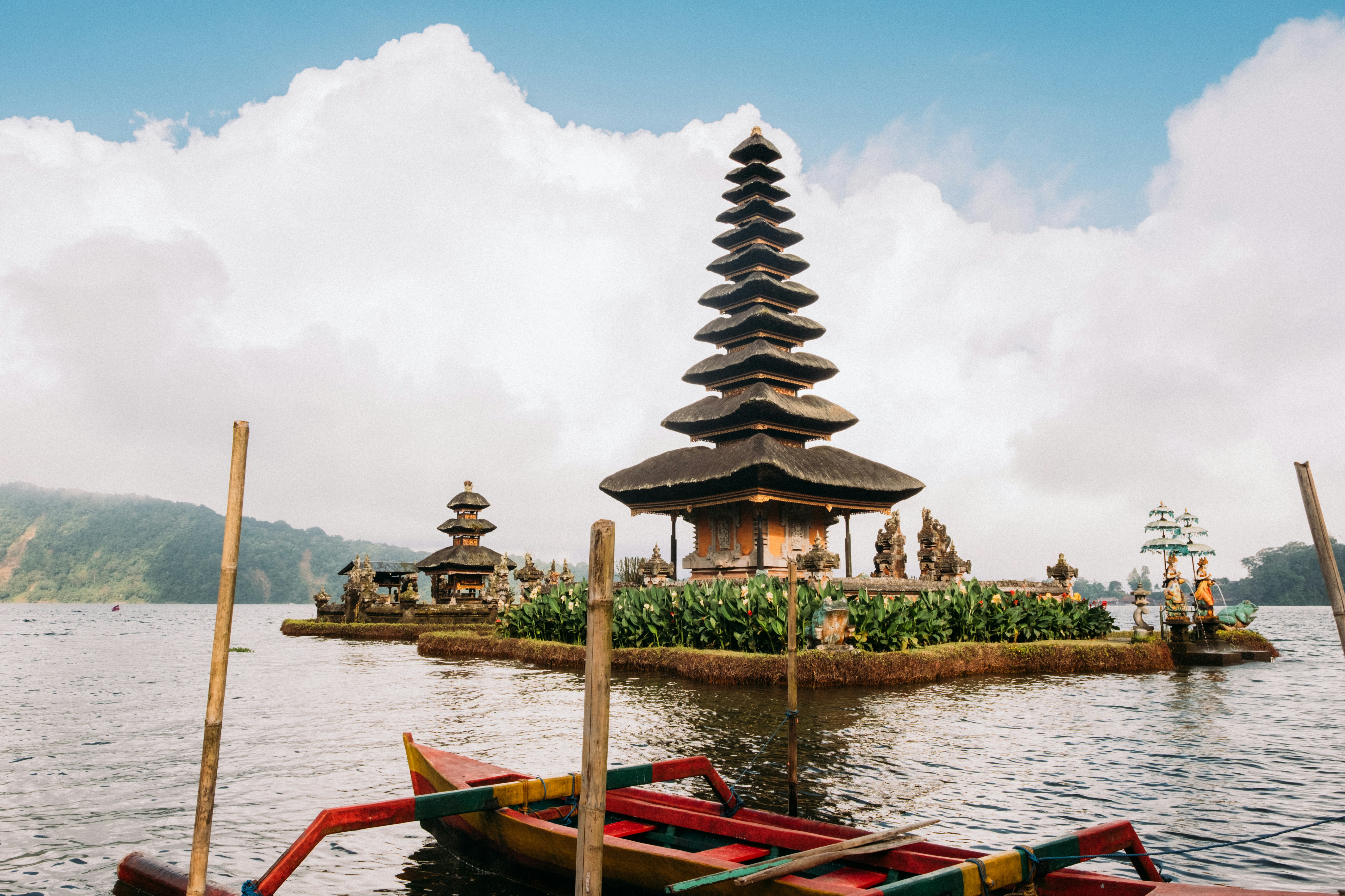 landscape photography of pagoda temple surrounded by body of water