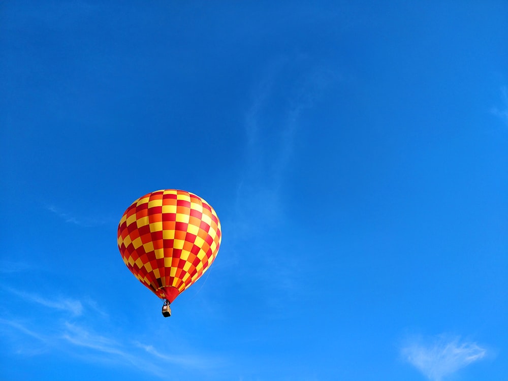 red and yellow checkered hot air balloon