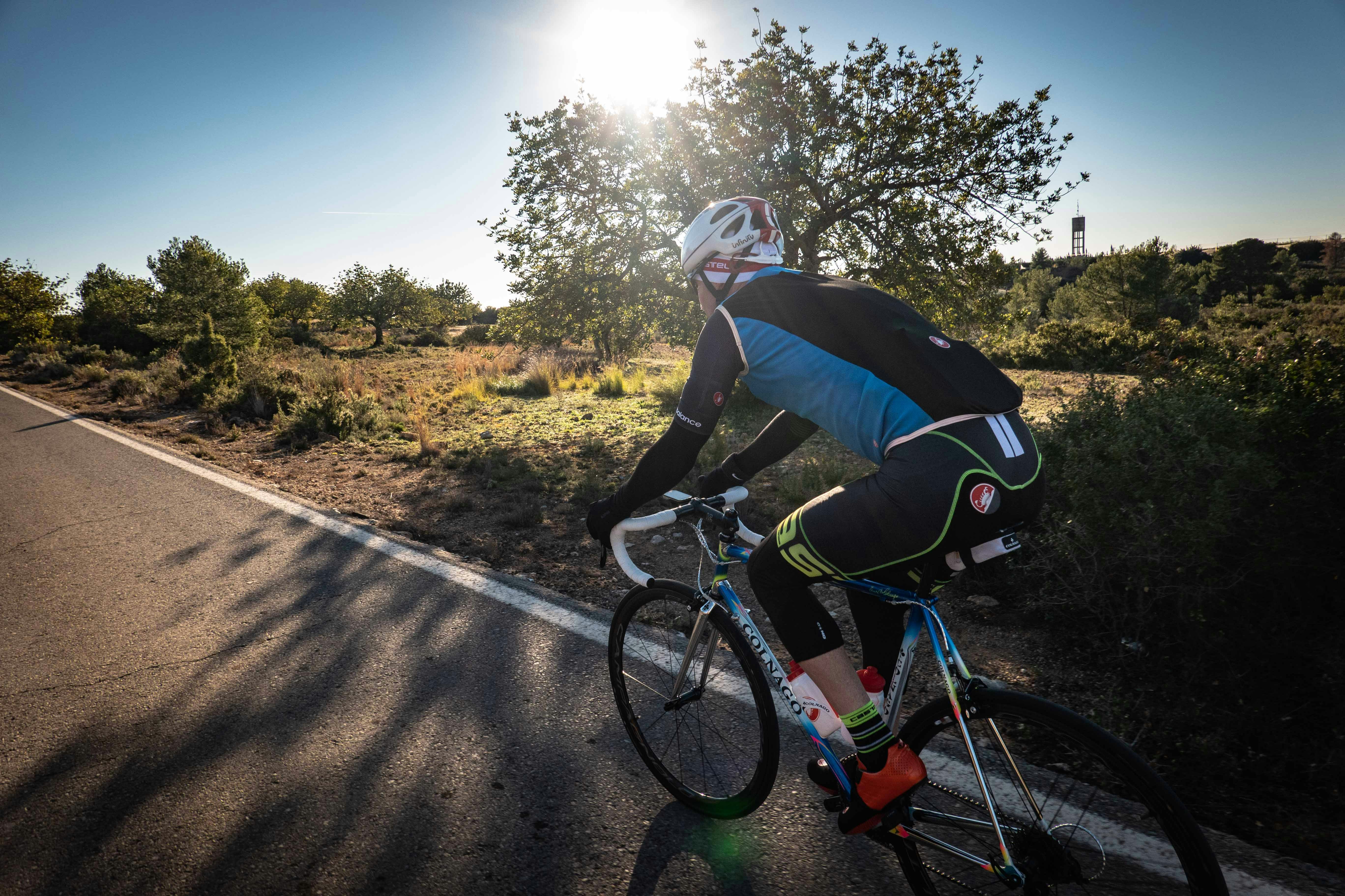 cyclist on road during daytime