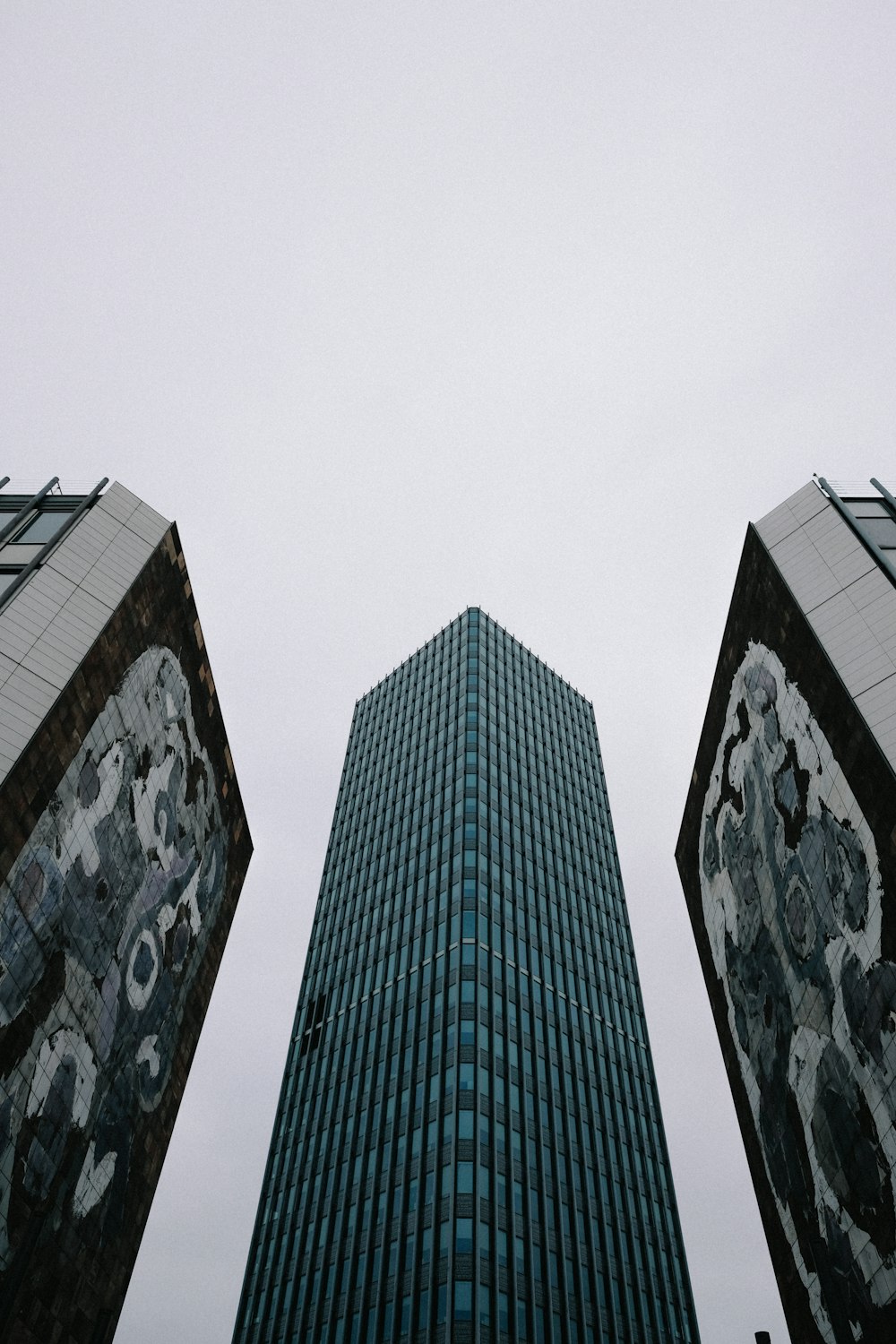 high rise building under gray sky