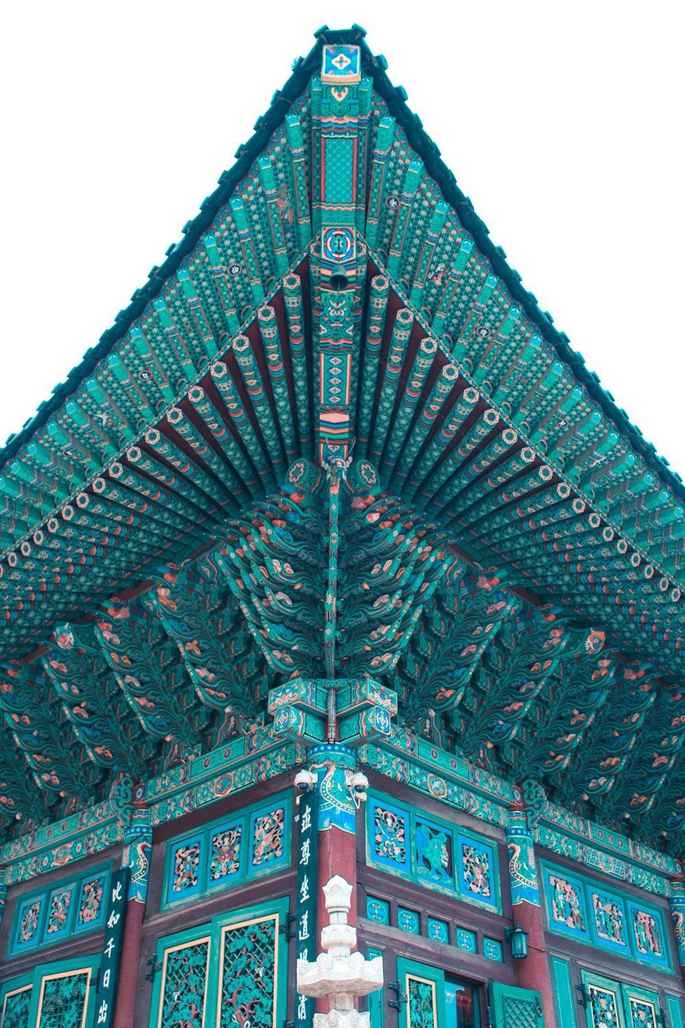 green pagoda temple during daytime