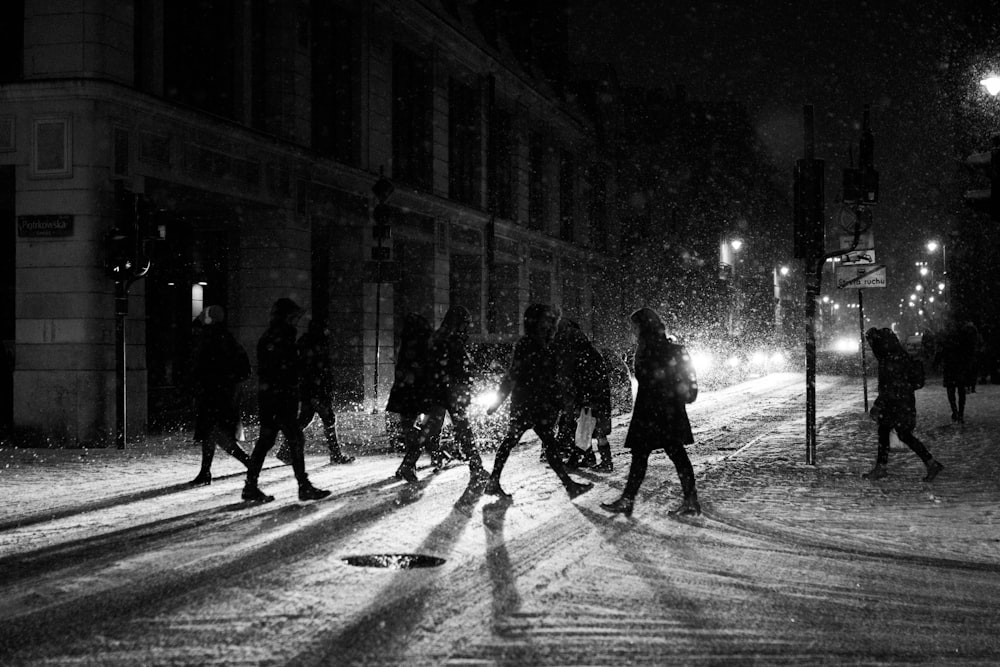 group of people walking on street