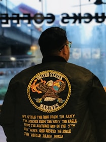 A Marine Corps emblem subtly displayed alongside medical tools in a clinical setting.